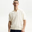 Textured short sleeve polo shirt